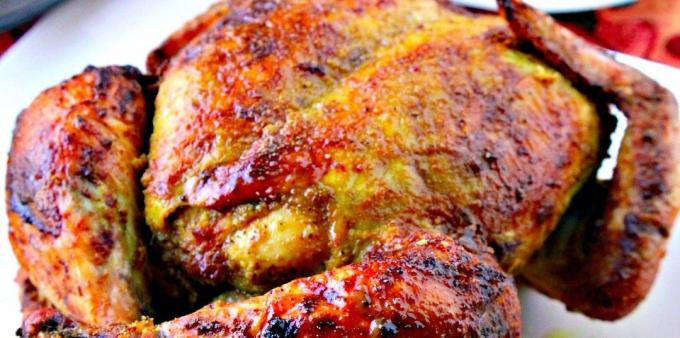 Hogyan kell főzni a csirkét a sütőbe: egy egész csirke az indiai joghurt pirospozsgás kéreg