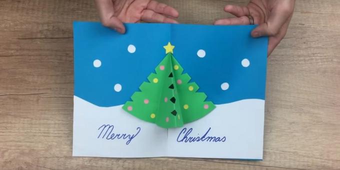 Karácsonyi üdvözlőlap saját kezűleg a karácsonyfa belül a térfogati